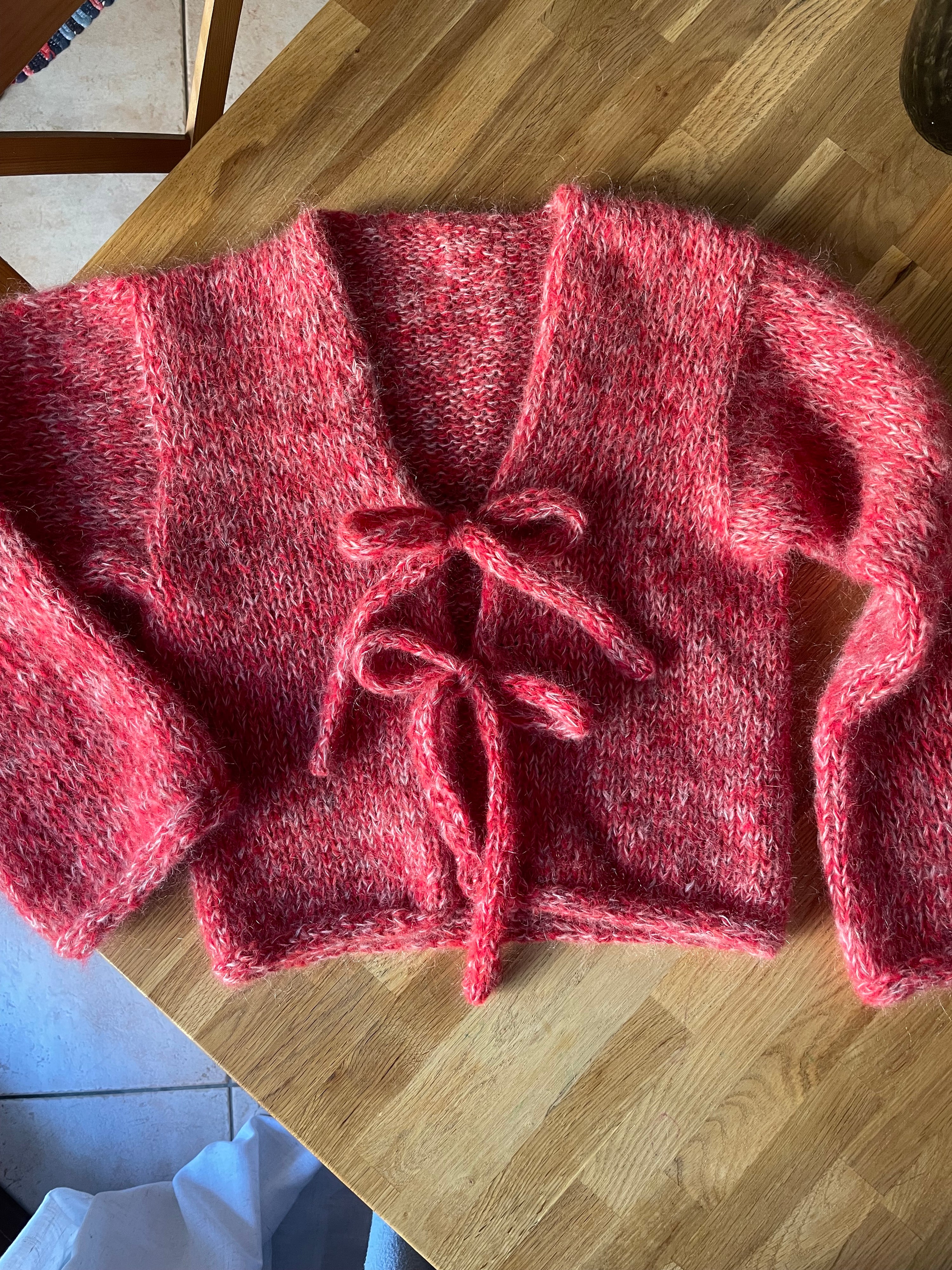 Cardigan con Laccetti