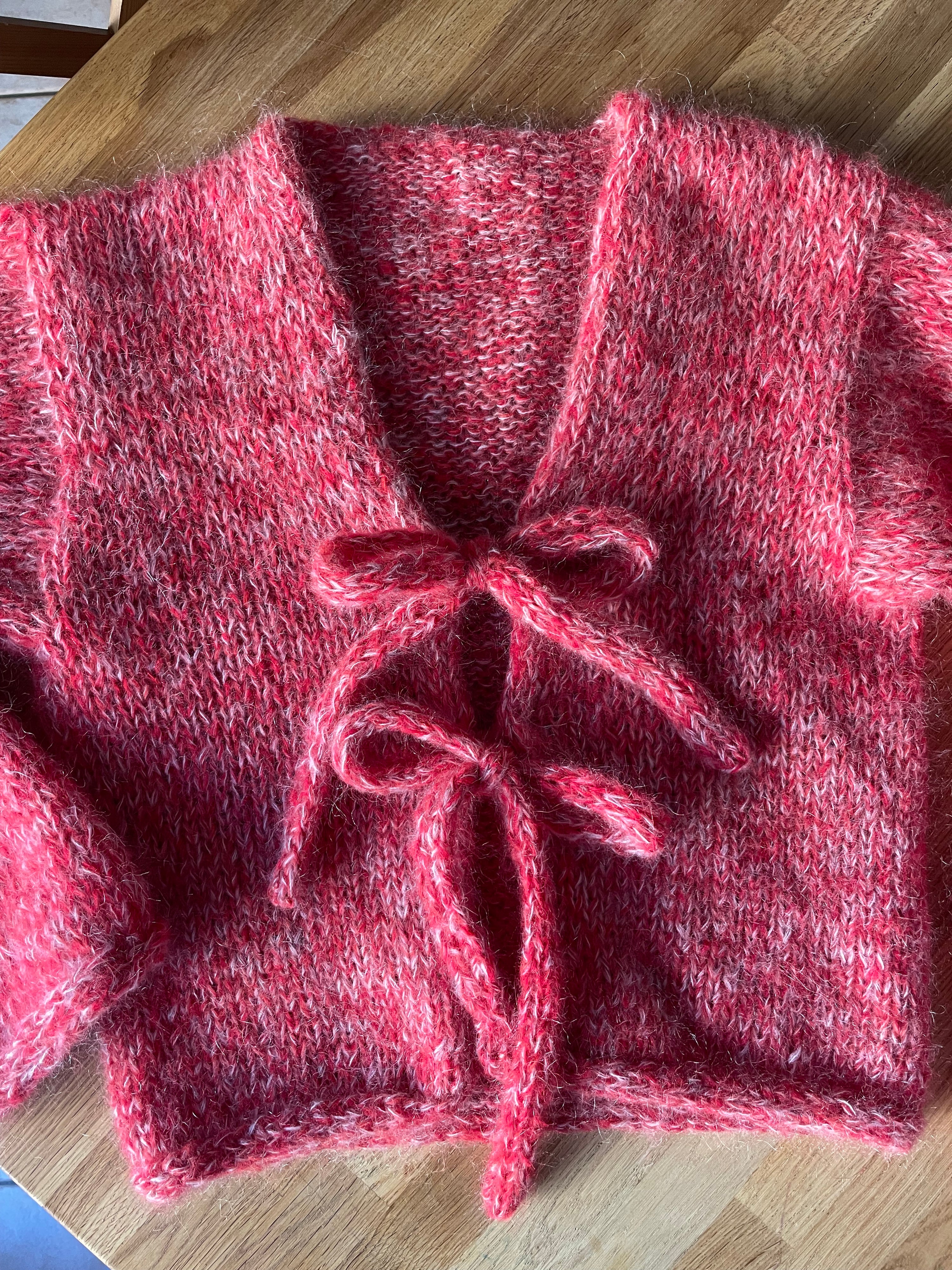 Cardigan con Laccetti
